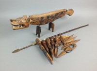 Lot 397 - An African hardwood and stained dragon boat...