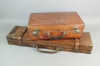 Lot 418 - A leather bound oak shotgun case, the oak...