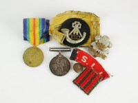 Lot 432 - A pair of World War I medals; War medal...