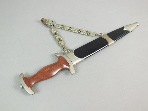Lot 452 - A Nazi SA 1933 dagger with wood handle and SA...