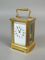 Lot 534 - A French gilt brass repeating carriage clock,...
