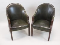 Lot 546 - A pair of green leather club chairs, 20th...