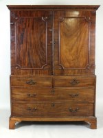 Lot 557 - A George III mahogany linen press, late 18th...