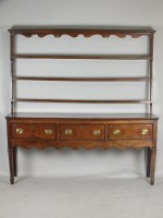 Lot 562 - A George III oak dresser, late 18th century,...