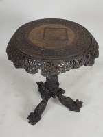 Lot 595 - A Burmese rosewood tripod table, 19th century,...