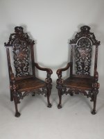 Lot 596 - An impressive pair of Victorian carved oak...