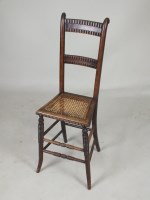 Lot 602 - A simulated rosewood beech framed correction...