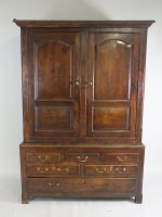 Lot 613 - A joined oak linen press, mid 18th century,...