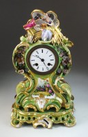 Lot 33 - A French porcelain mantel clock and stand,...