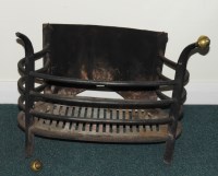 Lot 73 - An 18th century style wrought iron fire basket,...