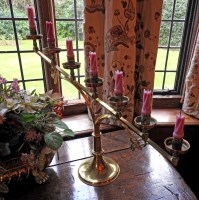 Lot 75 - A pair of late 19th century brass candle...