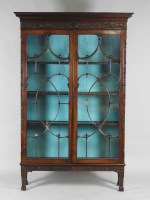 Lot 82 - A George III mahogany glazed bookcase with...