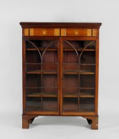 Lot 91 - A George III mahogany bookcase with inlaid...