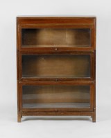 Lot 92 - A 20th century three section oak veneered...