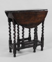 Lot 99 - An early 18th century and later small oak...