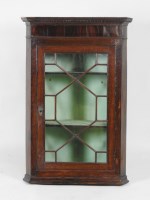 Lot 107 - A Victorian oak and mahogany wall hanging...