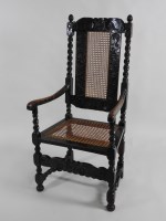 Lot 114 - A late Charles II carved walnut elbow chair,...