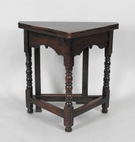 Lot 115 - A 17th century style oak credence type...