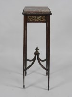 Lot 117 - A French Empire style mahogany torchere with...