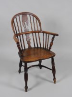 Lot 122 - A Victorian yew and elm low Windsor with...