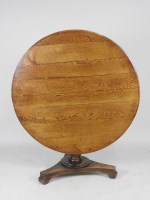 Lot 139 - A Victorian oak pedestal circular breakfast...