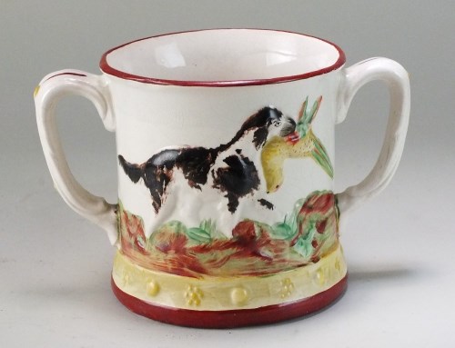 Lot 202 - A Staffordshire twin handled frog mug,...