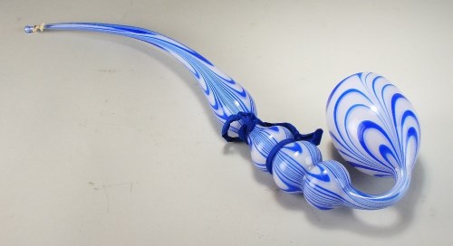 Lot 207 - A Nailsea glass pipe decorated with blue and...