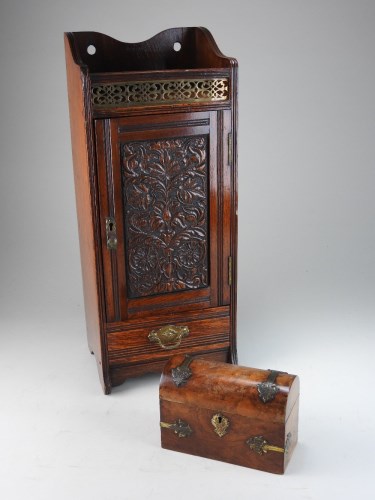 Lot 219 - An Edwardian oak smoker's cabinet, with...