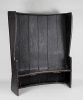 Lot 259 - A 19th century dark stained pine linear high...