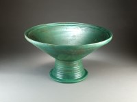 Lot 7 - A large Chinese apple-green glazed...
