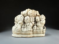 Lot 27 - An aragonite scholar's rock, the white and...