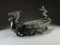 Lot 30 - A Chinese bronze dragon boat planter, 19th...