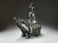 Lot 32 - A Chinese bronze elephant lantern or censer,...