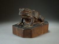 Lot 53 - A Chinese carved hardwood figure of a toad,...