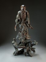 Lot 60 - A large Chinese carved rootwood figure of...