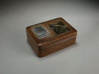 Lot 85 - A Japanese bronze and silver inlaid rosewood...