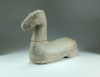 Lot 92 - A Chinese grey earthenware tomb figure of a...
