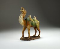 Lot 95 - A Chinese sancai glazed stoneware figure of a...