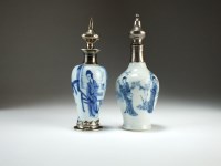 Lot 100 - Two Chinese blue and white vases with later...