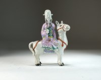 Lot 112 - A Chinese famille rose figure of Zhang Guolao,...