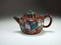 Lot 151 - A Chinese enamelled Yixing teapot and cover,...