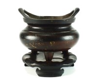 Lot 182 - A Chinese bronze censer and stand, Xuande mark...