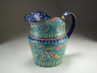 Lot 184 - A Chinese enamel jug, Qing, of ovoid form with...