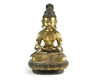 Lot 192 - A Chinese gilt bronze figure of Guanyin, Qing...
