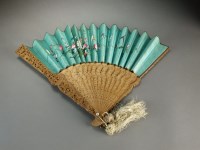 Lot 210 - A Chinese carved sandalwood and painted fan,...