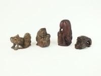 Lot 263 - Four Japanese wood netsuke, 19th/early 20th...
