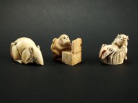 Lot 265 - Three Japanese ivory netsuke, Taisho era, the...