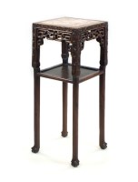 Lot 294 - A Chinese hardwood and marble urn stand, 19th...