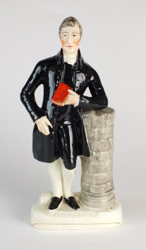 Lot 39 - A Staffordshire figure of the 'Rev John Elies'...