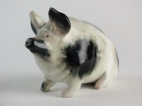 Lot 57 - A small black pig by Wemyss, circa 1900,...